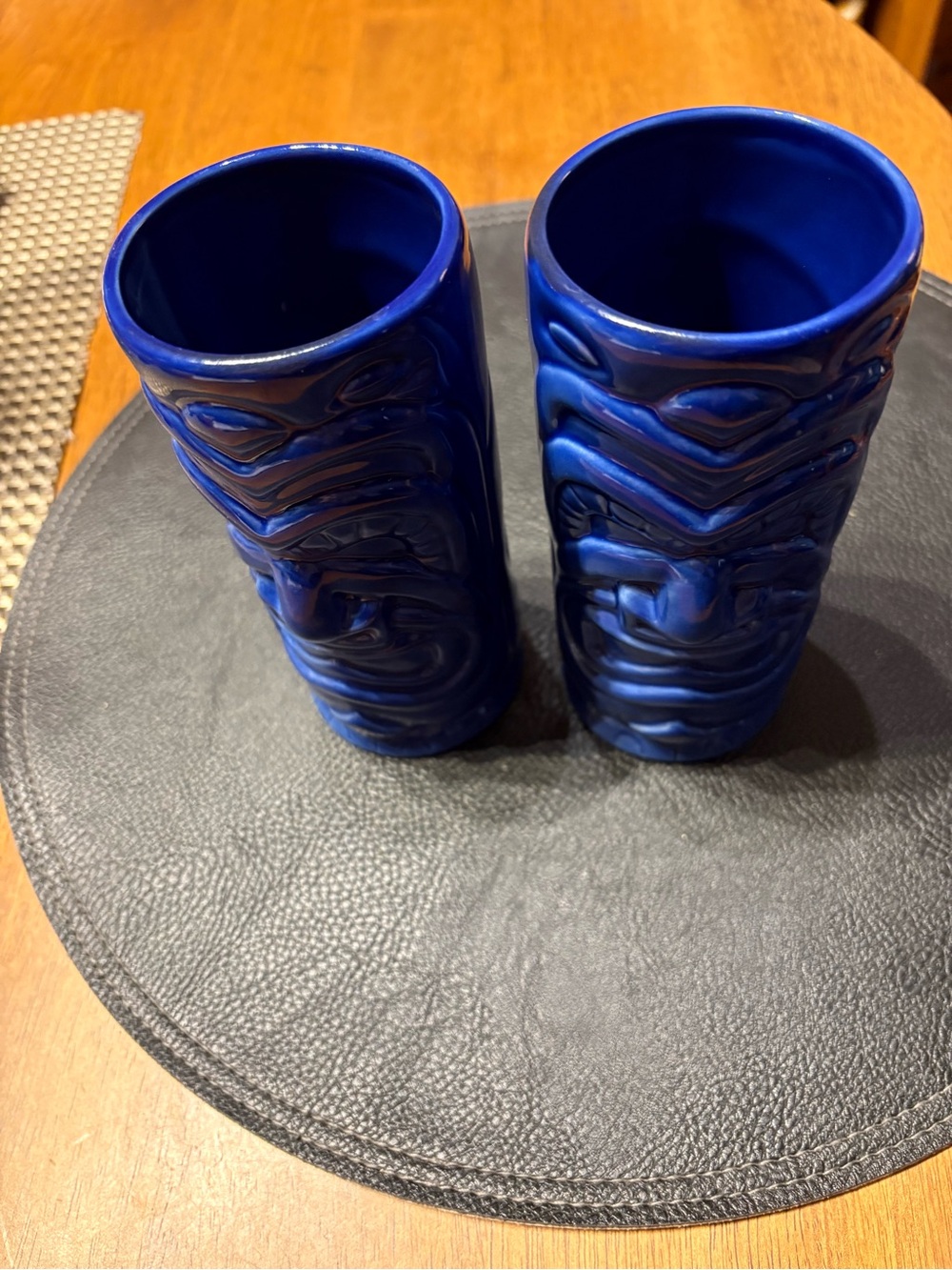 Hawaiian Tiki glasses. Set of 2 like new. Dark blue.